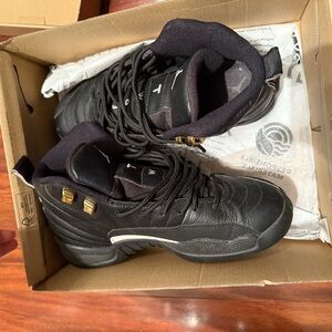 Jordan Black and Gold Sneakers